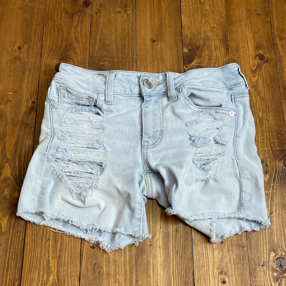 American Eagle Outfitters size 2 midi light wash destroyed shorts